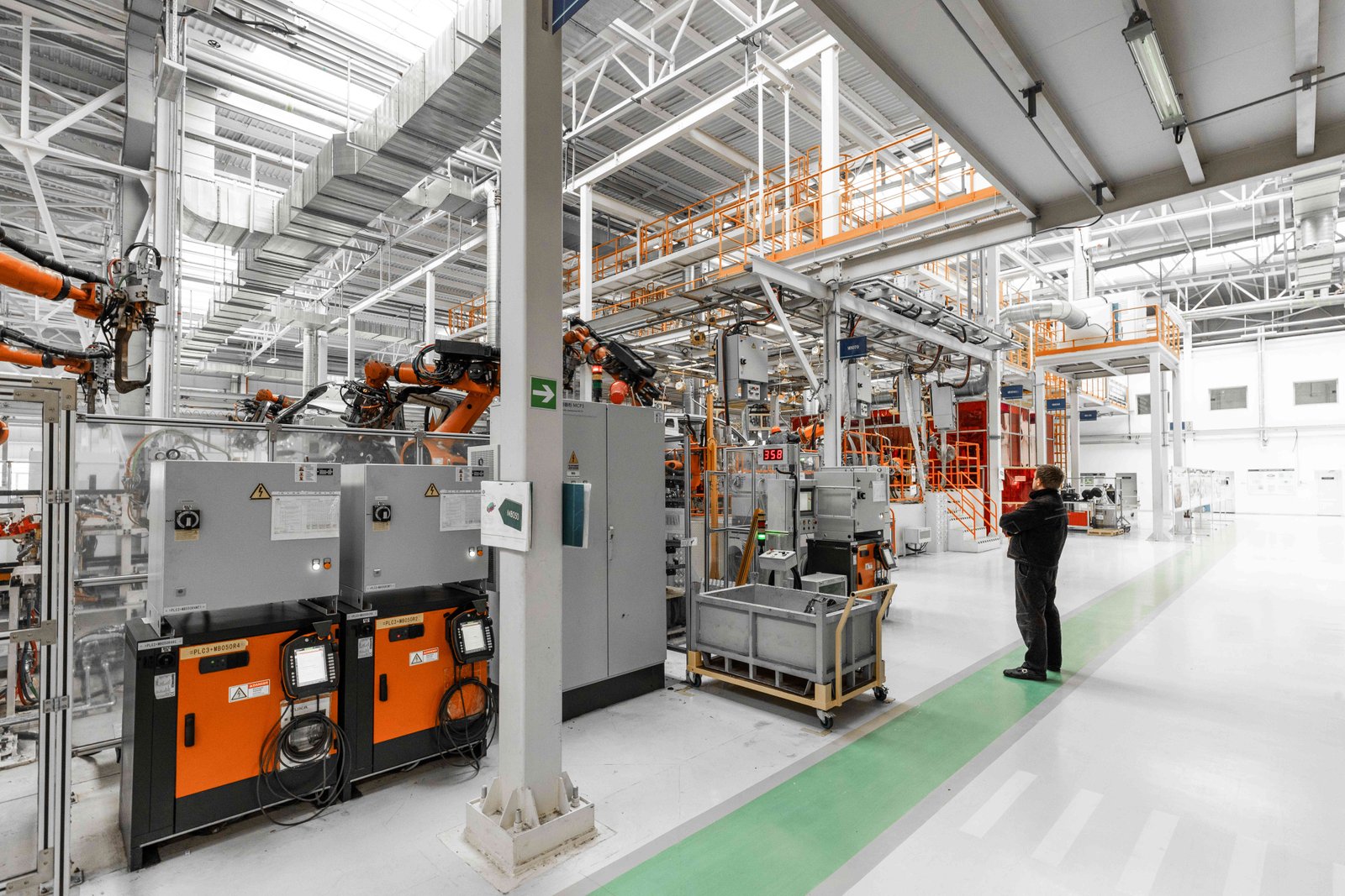 photo-automobile-production-line-welding-car-body-modern-car-assembly-plant-auto-industry-interior-hightech-factory-modern-production_optimized